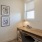 a room with a desk and chair