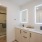 bathroom with a large mirror