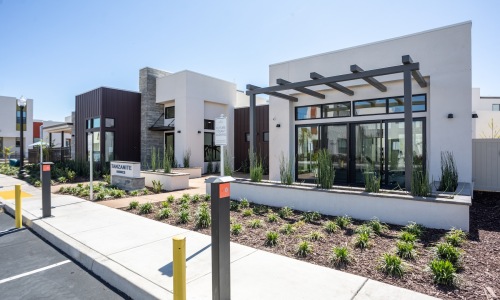 parking lot in front of a leasing office
