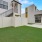 1-Bedroom House in Natomas, CA - Tanzanite - Backyard with Grass and Fence.